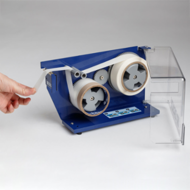 Material Dispenser with Liner Remover